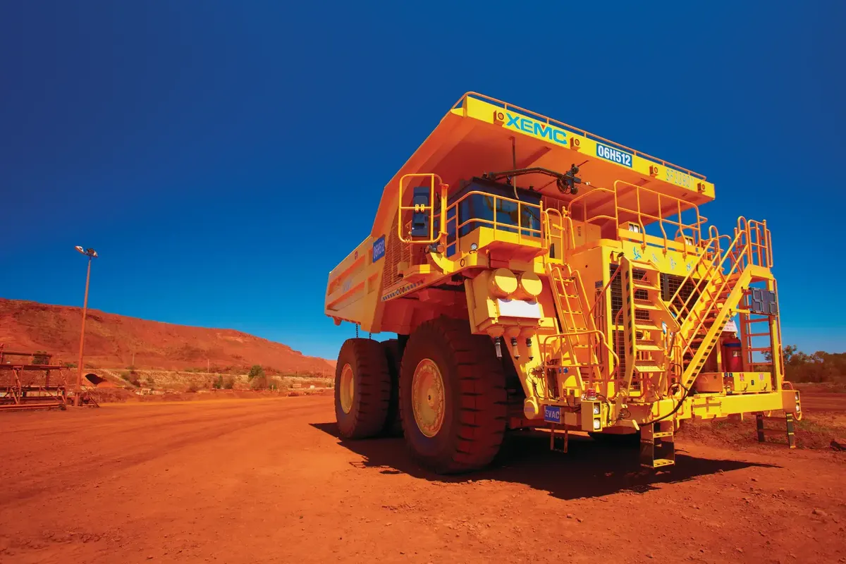 A mining haul truck on a red-earth site